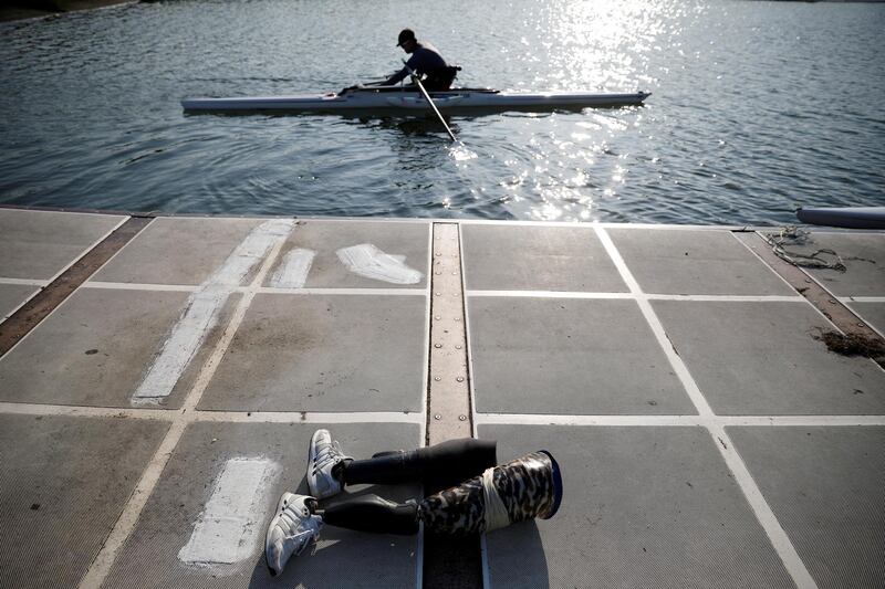 Former South Korean Army sergeant, first class, Ha Jae-hun, who lost both his legs in 2015 when he stepped on a North Korean landmine while on patrol in the demilitarized zone (DMZ), practises at Misari Rowing Stadium in Hanam, South Korea.  Reuters