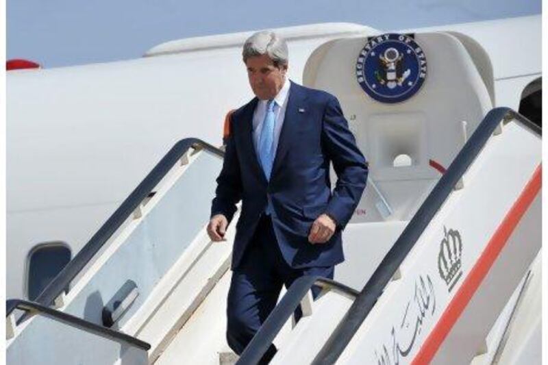 US secretary of state John Kerry arrives at the Queen Alia International Airport in Amman.