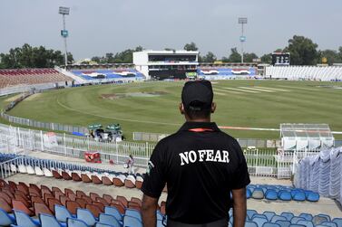 A member of the Police Elite Force stands guard at the Rawalpindi Cricket Stadium, after the New Zealand cricket team pulled out of a Pakistan cricket tour over security concerns, in Rawalpindi, Pakistan September 17, 2021.  REUTERS/Waseem Khan NO RESALES.  NO ARCHIVES