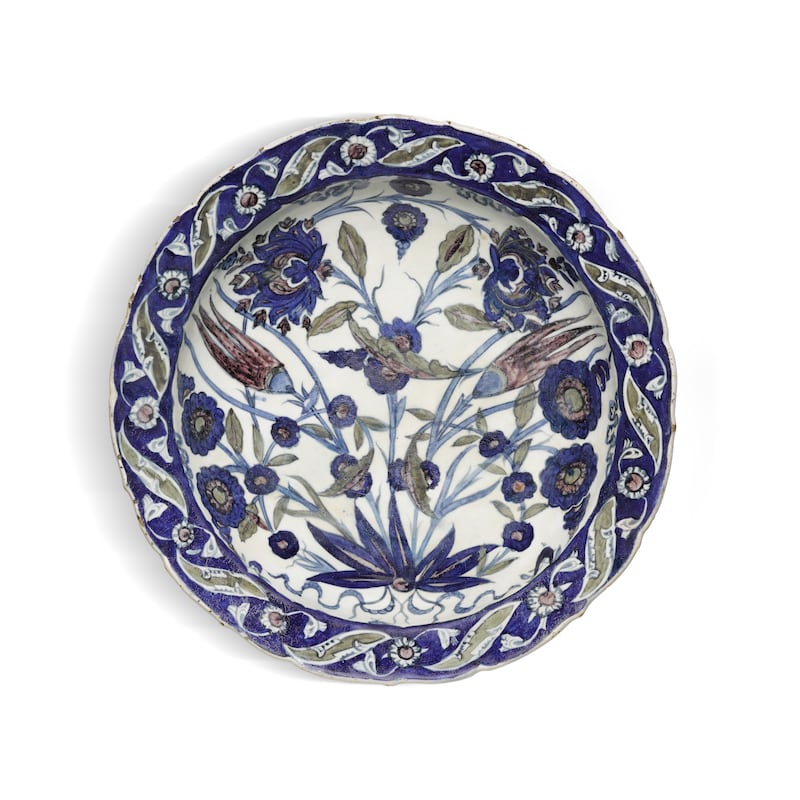 A rare Iznik 'Damascus' style pottery dish, Turkey, circa 1540-55 (estimate £100,000-150,000). 