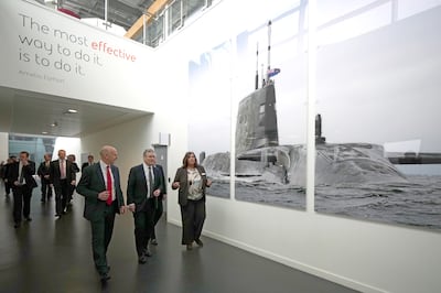 Labour leader Keir Starmer, centre, and shadow defence secretary John Healey, left, at the BAE Systems submarine academy. Getty