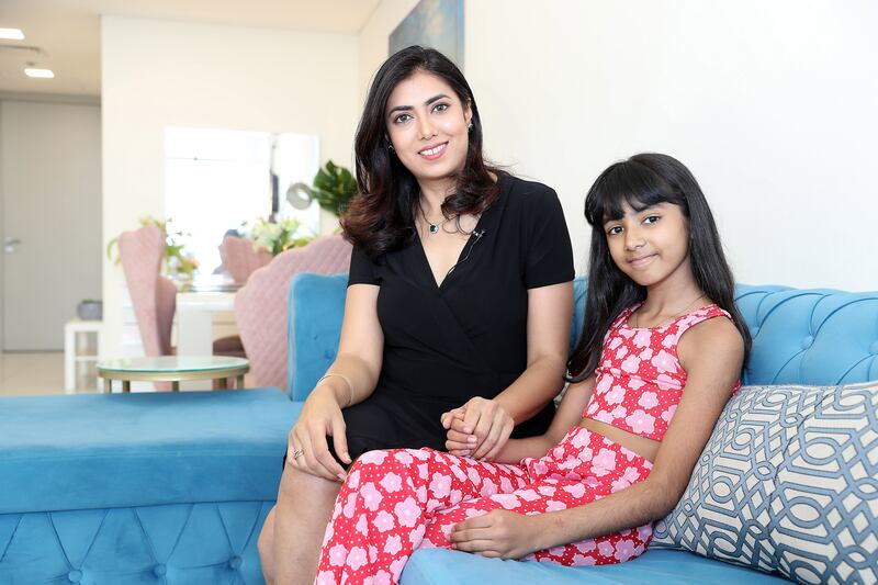 Taruna, pictured with her daughter Khimaya, pays Dh75,000  for a two-bed-apartment in Soul Avenue in Al Mamzar in Dubai. All photos: Pawan Singh / The National