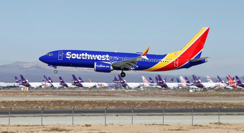 FILE - In this March 23, 2019, file photo, a Southwest Airlines Boeing 737 Max aircraft lands at the Southern California Logistics Airport in the high desert town of Victorville, Calif. Southwest Airlines Co. reports earns on Thursday, April 25. (AP Photo/Matt Hartman, File)