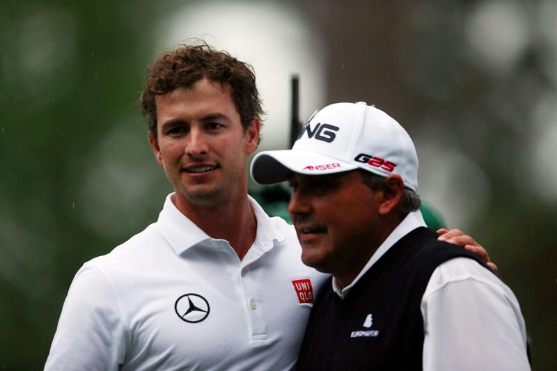 AUGUSTA, GA - APRIL 14: Adam Scott of Australia and Angel Cabrera of Argentina pose after the 2013 Masters Tournament at Augusta National Golf Club on April 14, 2013 in Augusta, Georgia.   Mike Ehrmann/Getty Images/AFP== FOR NEWSPAPERS, INTERNET, TELCOS & TELEVISION USE ONLY ==
 *** Local Caption ***  911813-01-09.jpg