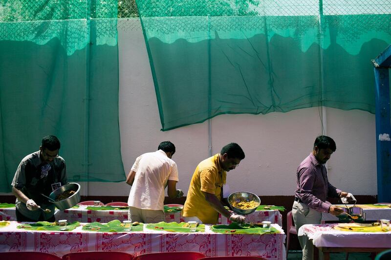 24/09/10 - Abu Dhabi, UAE -   Volunteers prepare food to serve 320 people during Onam.  Onam, the festival of Kerala, was held on Friday September 24, 2010 at the Kerala Social Centre in Abu Dhabi.  The festival was postponed due to Ramadan.  It features a 12-course meal and will host more than 2,000 people.   (Andrew Henderson / The National)