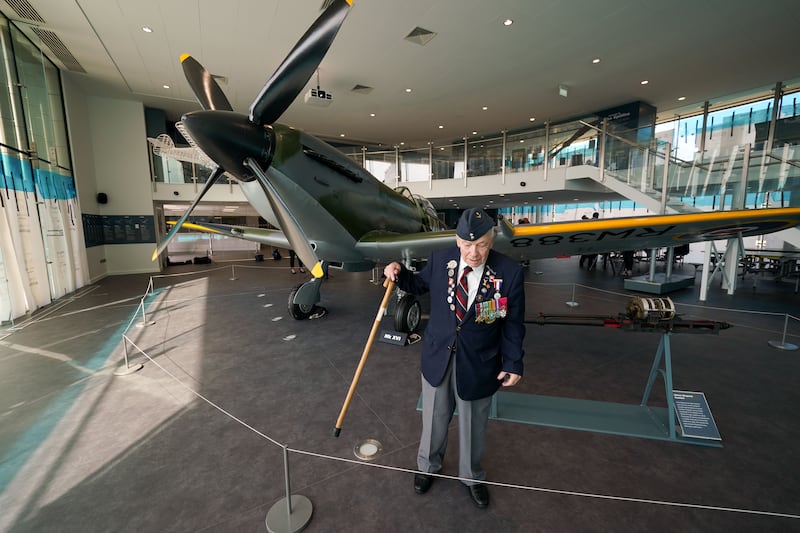 Bert Turner, a 97-year-old RAF bomber command veteran, stands by a reconditioned Spitfire, the new centre-piece of the Potteries Museum And Art Gallery in Stoke-on-Trent. PA