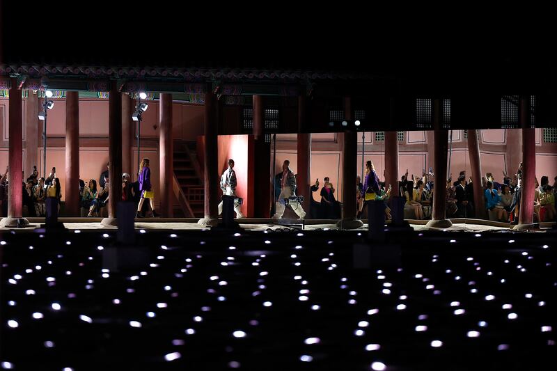 The Italian luxury label took over the 14th-century Seoul palace to showcase its cruise collection, blending Korean heritage and modern fashion. AP