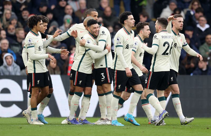 Alex Oxlade-Chamberlain celebrates with teammates after scoring Liverpool's second goal. Getty