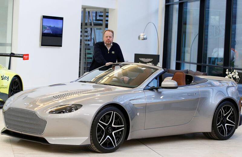 Andy Palmer, CEO of Aston Martin poses for a photograph at their world headquarters in Gaydon, Britain, February 14, 2019. Picture taken February 14, 2019. To match Insight BRITAIN-EU/AUTOS REUTERS/Andrew Yates