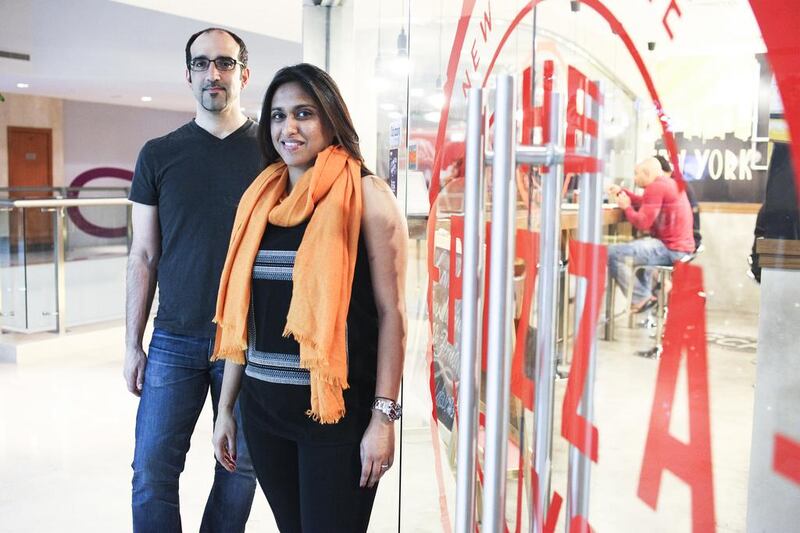 A reader gives cautious welcome to Bitcoin transactions in the UAE. The Pizza Guys in Dubai accepts the digital currency. Above, the restaurant’s co-founders Rami Badawi and Amber Haque. Lee Hoagland / The National


