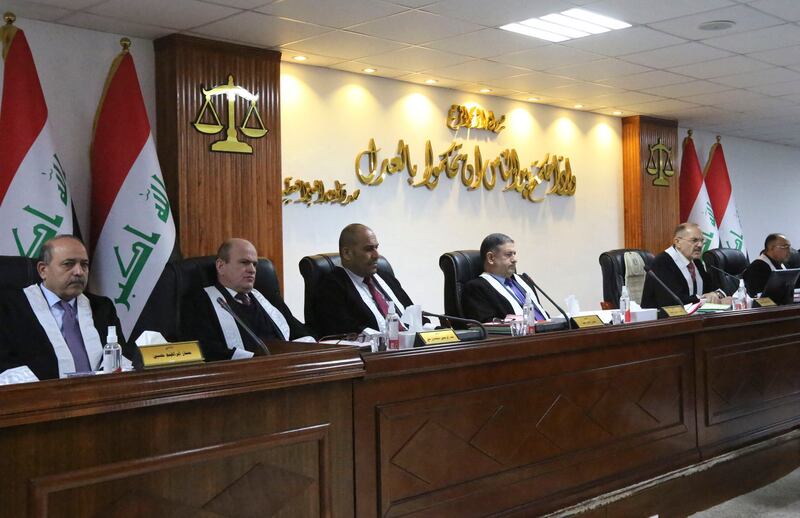 Iraqi judges attend a court session at the Supreme Judicial Council in Baghdad. AFP