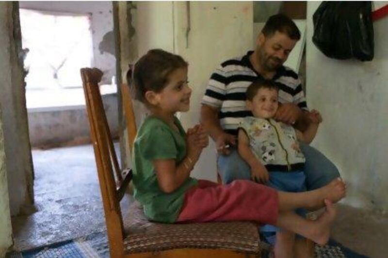 A Syrian family in a home provided to them by Turkish relatives in the border village of Guvecci.