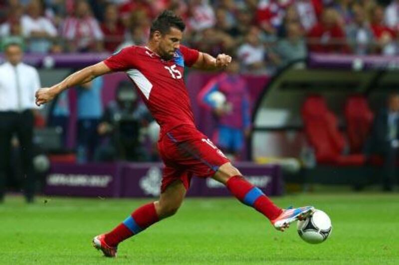 WARSAW, POLAND - JUNE 21: Milan Baros of Czech Republic with the ball during the UEFA EURO 2012 quarter final match between Czech Republic and Portugal at The National Stadium on June 21, 2012 in Warsaw, Poland.  (Photo by Alex Grimm/Getty Images)