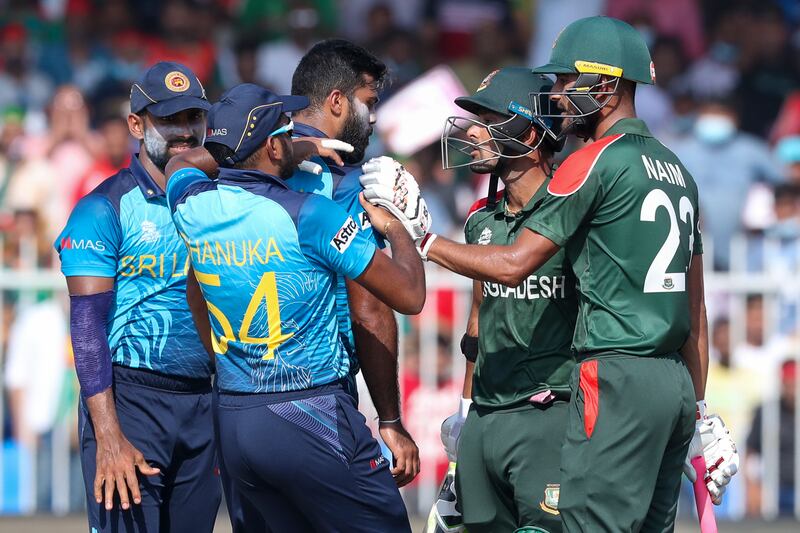 Bangladesh's Liton Das, second right, has altercation with Sri Lankan bowler Lahiru Kumara after he was dismissed during their T20 World Cup match in Sharjah on Sunday, October 24, 2021. AP