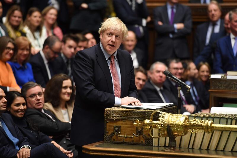 TOPSHOT - A handout picture taken and released by the UK Parliament in London on December 17, 2019, shows Britain's Prime Minister Boris Johnson speaking at the dispatch box in the House of Commons in London, during the first sitting of Parliament since the general election. The British parliament reconvened on Tuesday with many new faces, after Prime Minister Boris Johnson's Conservatives won a sweeping victory in last week's election. Britain is seeking to outlaw any extension to the Brexit transition period beyond 2020, the government said on Tuesday, sinking the pound and leaving Brussels fearing a race against the clock to strike a new trade deal. - RESTRICTED TO EDITORIAL USE - MANDATORY CREDIT " AFP PHOTO / UK PARLIAMENT / JESSICA TAYLOR  " - NO USE FOR ENTERTAINMENT, SATIRICAL, MARKETING OR ADVERTISING CAMPAIGNS - EDITORS NOTE THE IMAGE HAS BEEN DIGITALLY ALTERED AT SOURCE TO OBSCURE VISIBLE DOCUMENTS
 / AFP / UK PARLIAMENT / JESSICA TAYLOR / RESTRICTED TO EDITORIAL USE - MANDATORY CREDIT " AFP PHOTO / UK PARLIAMENT / JESSICA TAYLOR  " - NO USE FOR ENTERTAINMENT, SATIRICAL, MARKETING OR ADVERTISING CAMPAIGNS - EDITORS NOTE THE IMAGE HAS BEEN DIGITALLY ALTERED AT SOURCE TO OBSCURE VISIBLE DOCUMENTS
