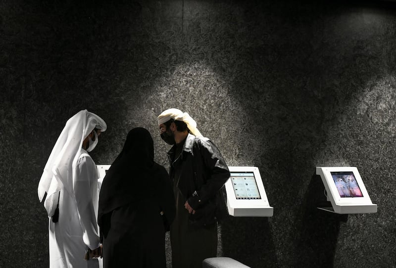 Abu Dhabi, United Arab Emirates - Visitors learn about the historical stages of United Arab Emirates through films, photos and artifacts at the National Archives pavilion in Sheikh Zayed Heritage Festival, Al Wathba. Khushnum Bhandari for The National