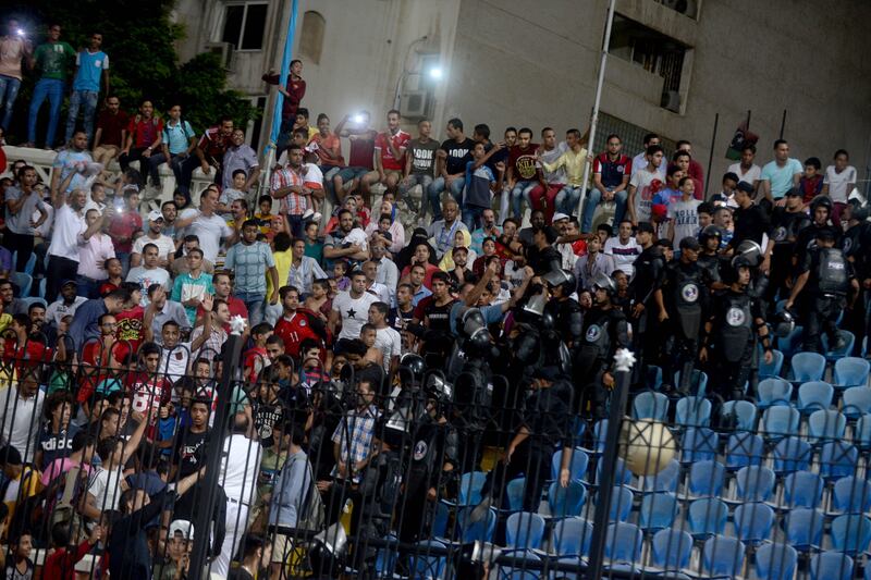 Supporters of Jordanian side Al Faisaly react during the Arab Club Championship final against Tunisia's Esperance de Tunis in Alexandria, Egypt, late on Sunday night. Mohamed Hossam / EPA