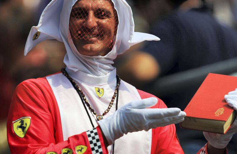 MONZA, ITALY - SEPTEMBER 10:  Ferrari tifosi fan is seen during qualifying for the Italian Formula One Grand Prix at the Autodromo Nazionale di Monza on September 10, 2011 in Monza, Italy.  (Photo by Vladimir Rys/Getty Images)