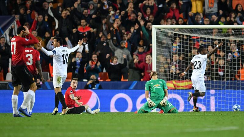 VALENCIA, SPAIN - DECEMBER 12:  Phil Jones of Manchester United reacts after he scores an own goal during the UEFA Champions League Group H match between Valencia and Manchester United at Estadio Mestalla on December 12, 2018 in Valencia, Spain.  (Photo by Dan Mullan/Getty Images)