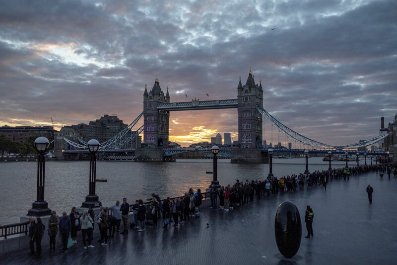 People queue near Tower Bridge, London to pay their respects after the death of Britain's Queen Elizabeth. Reuters