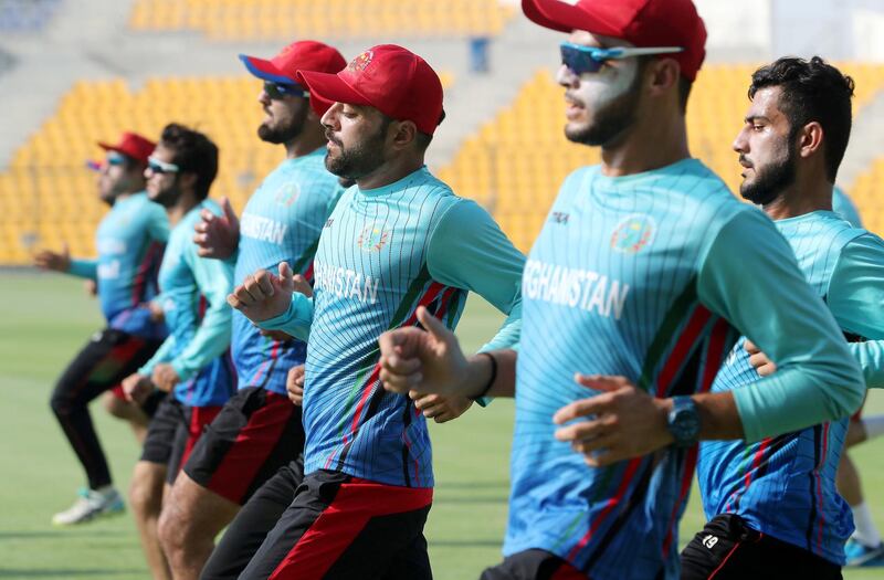 ABU DHABI ,  UNITED ARAB EMIRATES , AUGUST 22 – 2019 :- Rashid Khan, captain ( center ) with the members of the Afghanistan cricket team during the training ahead of their tour to Bangladesh at the Zayed Cricket Stadium in Abu Dhabi. ( Pawan Singh / The National ) For Sports. Interview Story by Amith