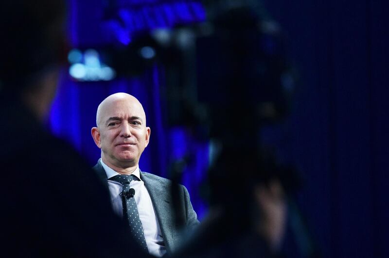 Blue Origin founder Jeff Bezos speaks after receiving the 2019 International Astronautical Federation (IAF) Excellence in Industry Award during the the 70th International Astronautical Congress at the Walter E. Washington Convention Center in Washington, DC on October 22, 2019.  / AFP / MANDEL NGAN
