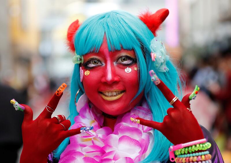 A participant in costume poses for a photo during a Halloween event in Kawasaki. EPA