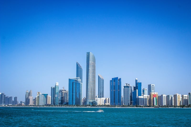 Abu Dhabi-based IHC is rapidly expanding its portfolio through local and global acquisitions and investments. Shutterstock