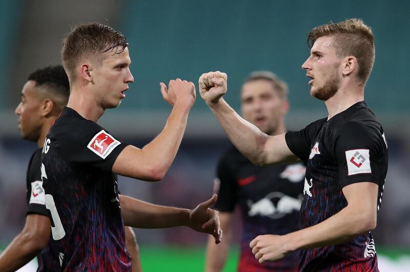 Timo Werner celebrates with teammate Dani Olmo after scoring against Dusseldorf. Getty