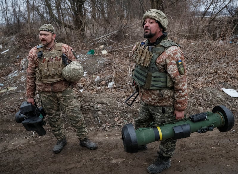 Ukrainian troops with a Javelin anti-tank missile on the front line in the northern Kyiv region. Reuters