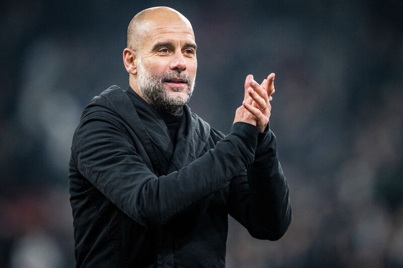Manchester City manager Pep Guardiola applauds the crowd after the match. AP