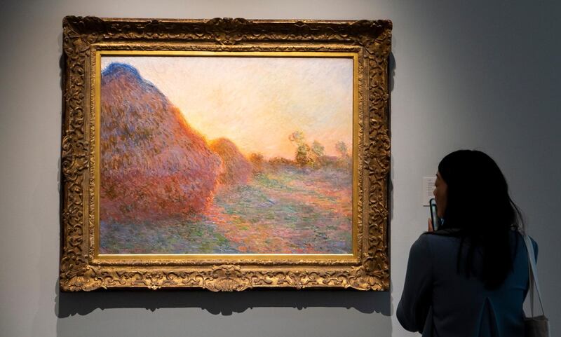 epa07544875 The 1890 painting 'Meules' by Claude Monet, estimated to sell for over 55 million USD, is on display during a preview of upcoming 'Impressionist and Modern Art' and 'Contemporary Art' auctions at Sotheby's in New York, New York, USA, 03 May 2019. The auctions take place in the middle of May.  EPA/JUSTIN LANE