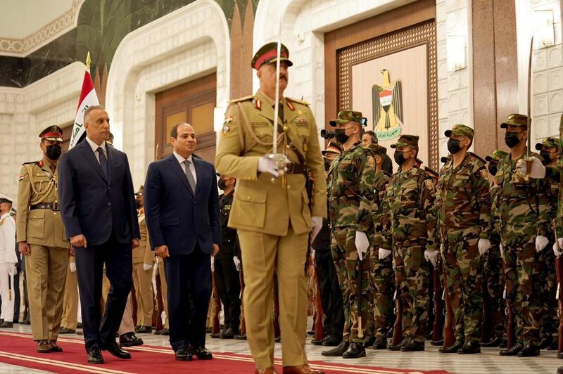 Iraqi Prime Minister Mustafa Al-Kadhimi receives Egyptian President Abdel Fattah El-Sisi in Baghdad. Iraqi Prime Minister Media Office, Handout via REUTERS