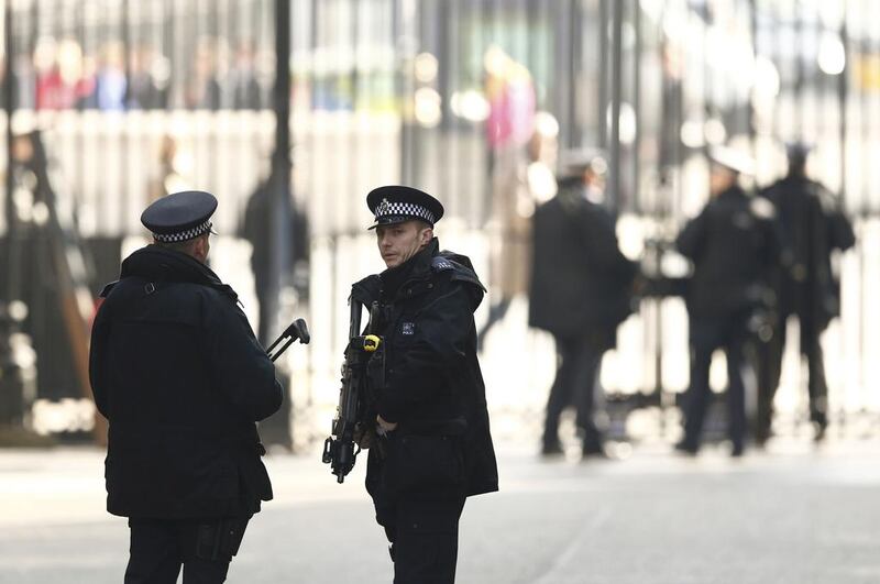 Armed police stand on guard at Downing Street in London, Britain March 22, 2016. Britain’s Prime Minister David Cameron said he would chair a crisis response meeting following explosions in Brussels on Tuesday. Eddie Keogh/Reuters