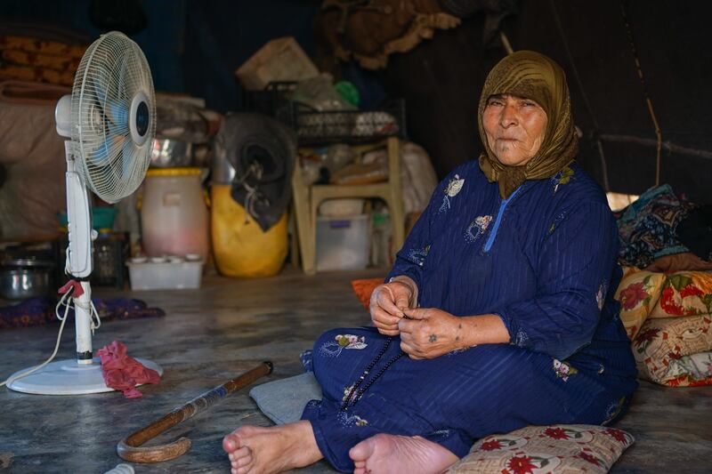 Joria al-Ali, an elderly displaced woman who lives in a tent in  Al-Tah camp, north of Idlib, said: 'Cutting off relief means our end. Here we live without a breadwinner in a very difficult situation and poverty' 
