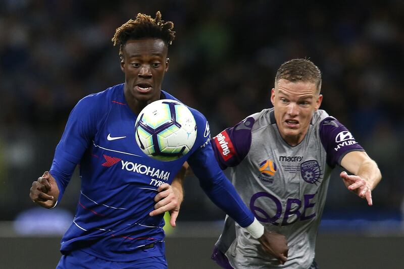 Tammy Abraham and Shane Lowry of Perth Glory contest for the ball. Getty Images