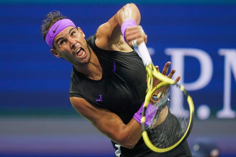 Rafael Nadal of Spain returns the ball against Marin Cilic of Croatia in their Round Four Men's Singles tennis match during the 2019 US Open at the USTA Billie Jean King National Tennis Center in New York.  AFP