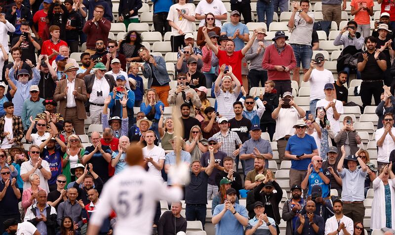 Fans at Edgbaston celebrate after England's Jonny Bairstow reaches his century. Reuters