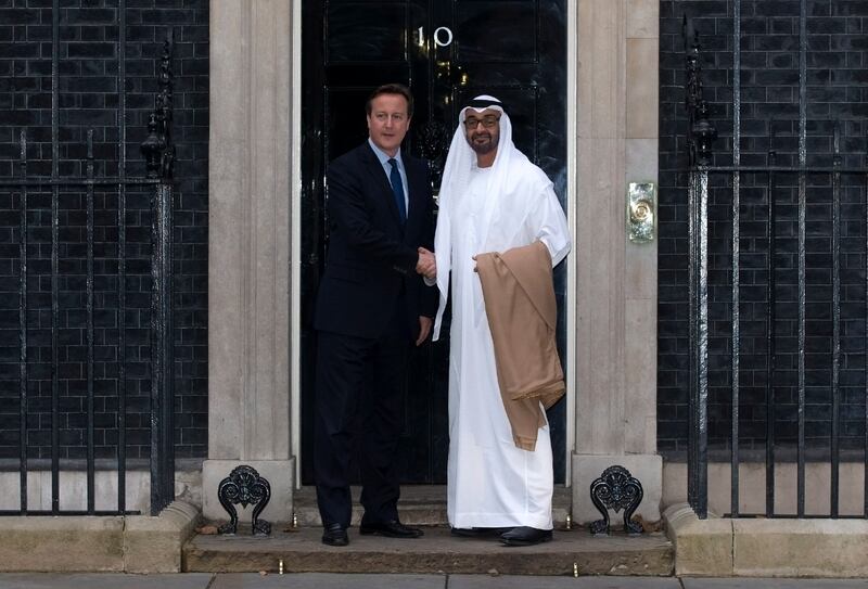 British Prime Minister David Cameron greets the Crown Prince of Abu Dhabi, Sheikh Mohamed bin Zayed at 10 Downing Street on October 16, 2014 in London. Getty Images