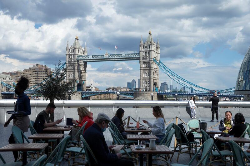 LONDON, ENGLAND - MAY 19: General view of Tower Bridge from the outdoor dining area at Tavolino Bar & Kitchen on May 19, 2021 in London, England. Although indoor drinking and dining were permitted in England with yesterday's Covid-19 lockdown easing, there remain social distancing rules and restrictions on party size that prevent many restaurants from returning to full capacity. The next phase of reopening, when all limits on social contact are due to be lifted on June 21, is vital to the recovery of the hospitality business. (Photo by Hollie Adams/Getty Images)