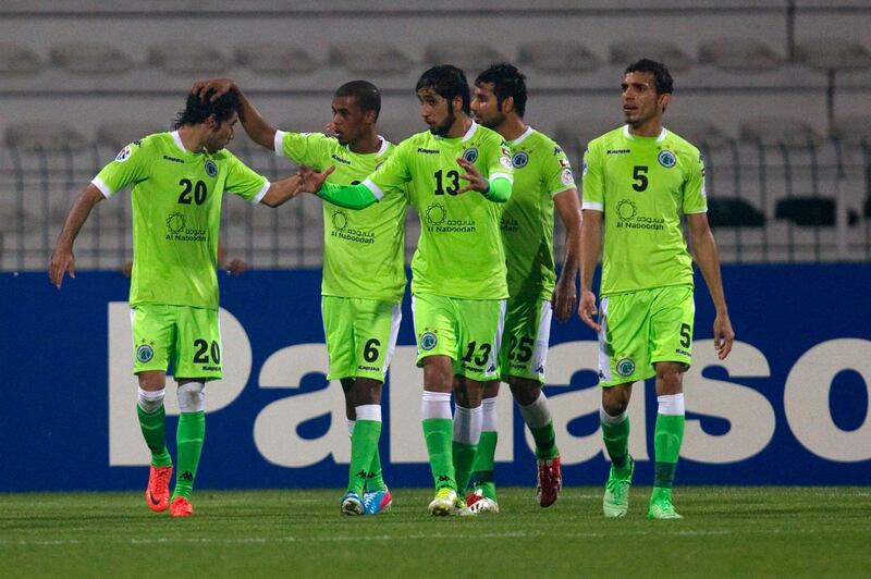 Dubai, United Arab Emirates, April 3, 2013:    Al Shabab's Naser Masood, left, celebrates his goal with teammates against Al Ettifaq during their Asian Champions League match at Maktoum Bin Rashid Stadium in Dubai on April 3, 2013. Christopher Pike / The National