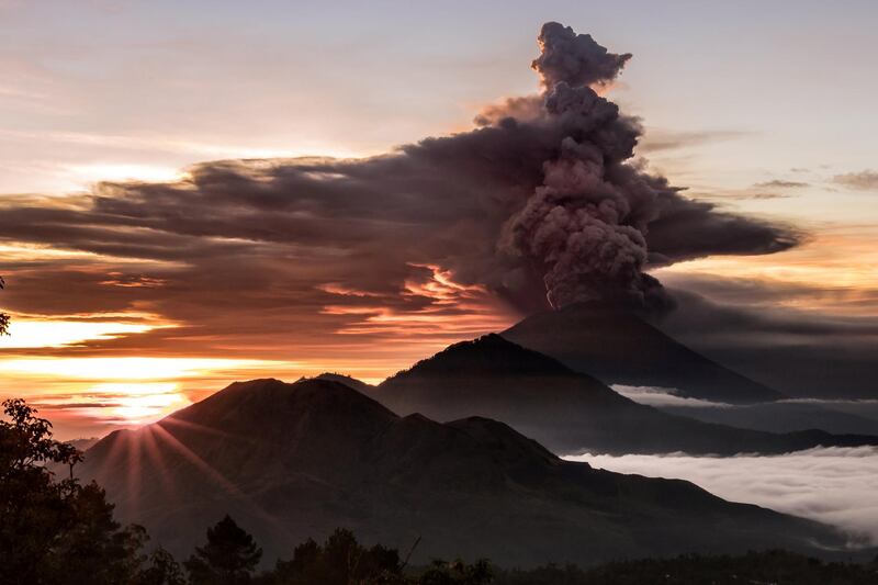 Mount Agung volcano is seen spewing smoke and ash in Bali, Indonesia. Emilio Kuzma-Floyd / via Reuters