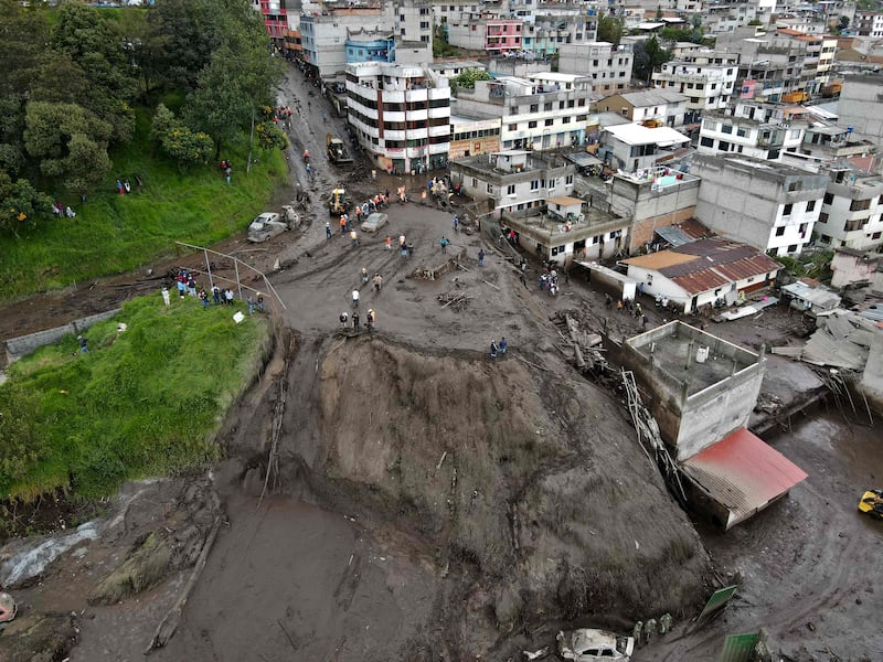 A mudslide in Quito, Ecuador, caused by the South American country's heaviest floods in two decades that killed at least 18 people in Quito, washed away cars, damaged homes and swept away volleyball players and spectators on a sports field. AFP