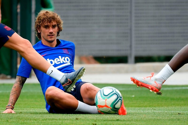 Barcelona's French forward Antoine Griezmann takes part in a pre-season training session at the Joan Gamper training ground in Sant Joan Despi near Barcelona. AFP
