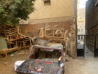 An old car at Cairo's City of the Dead where a government project to build a network of roads and flyovers in the area has resulted in the demolition of many tombs. Kamal Tabikha / The National