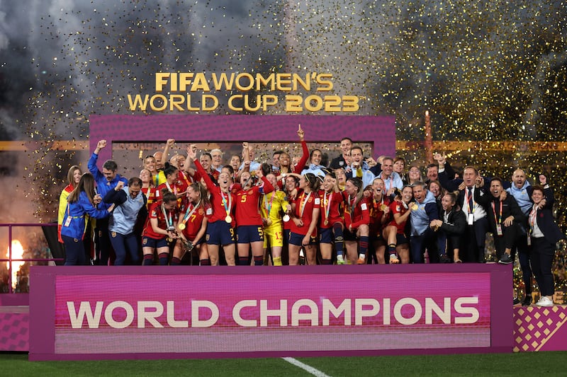 Members of the Spain squad celebrate after beating England 1-0 in the final of the Fifa Women's World Cup at Sydney's Stadium Australia on Sunday. Getty