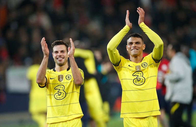 Chelsea's Cesar Azpilicueta and Thiago Silva celebrate after beating Lille 2-1 to make the Champions League last eight. AP