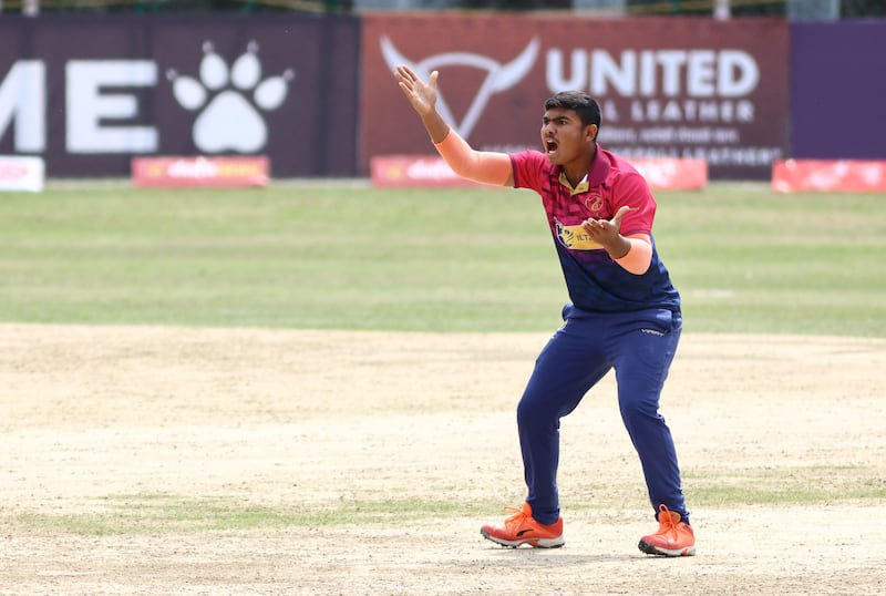 Aayan Khan of the UAE picked up three wickets against Nepal in the tri-series final. Subas Humagain for The National
