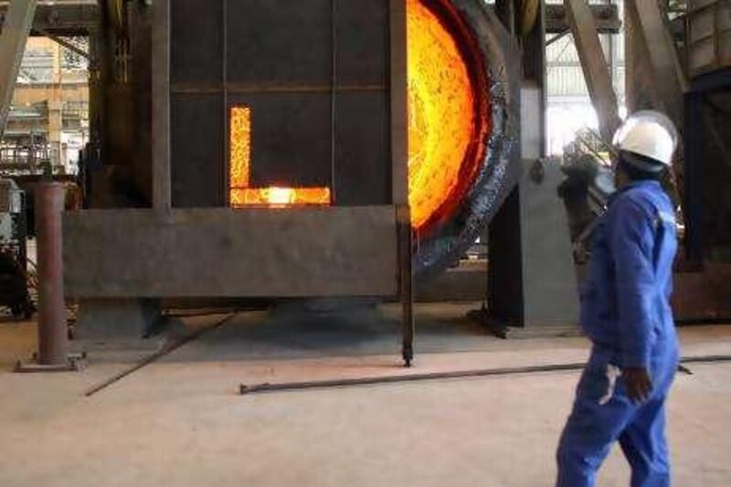 June 17, 2009 / Abu Dhabi / A steel worker at Emirates Steel Industries in Musaffah June 17, 2009. (Sammy Dallal / The National)

 *** Local Caption ***  sd-061709-steel-05.jpgsd-061709-steel-05.jpg