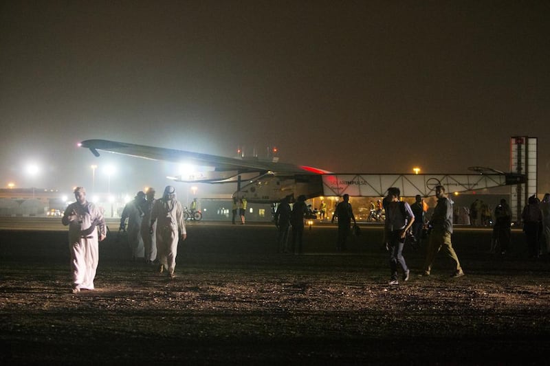 'Solar Impulse 2' sits on the tarmac at Abu Dhabi's Al Bateen Executive Airport in the early hours of July 26, 2016, after completing its round-the-world flight.